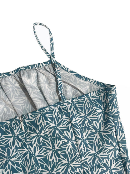 Robe d’été élégante à bretelles avec fente latérale